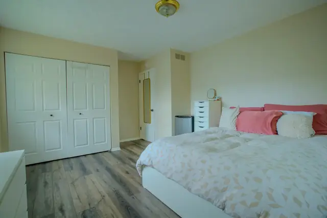 Bedroom one, double closet, 1522 Burcham Dr, East Lansing student rental