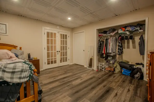 Bedroom three, French doors and closet, 1522 Burcham Dr, East Lansing student rental