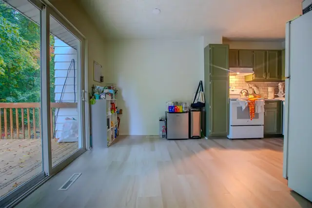 Dining, with the door to your private deck, 1524 Burcham Dr, East Lansing student rental