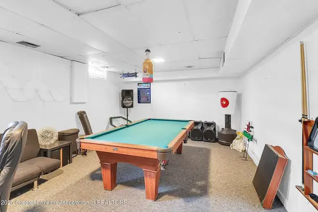 Basement hangout, pool table, 1542 Ann Street, East Lansing student rental