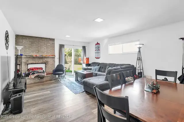 Living room with fireplace, 1542 Ann Street, East Lansing student rental